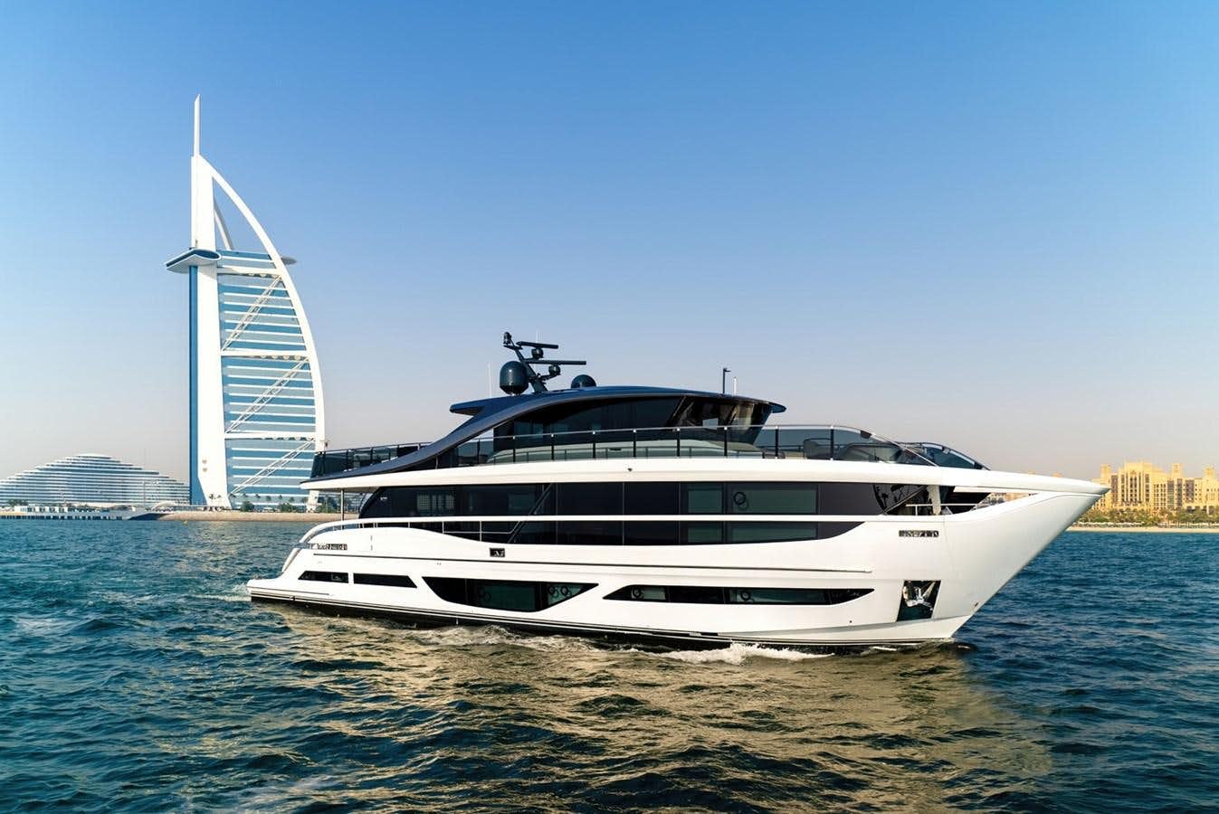 a white yacht on the water aboard 2022 PRINCESS X95 Yacht for Sale