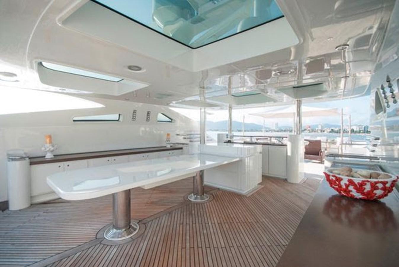 a room with a large white table and chairs aboard 2024 MCP MY 140 Yacht for Sale