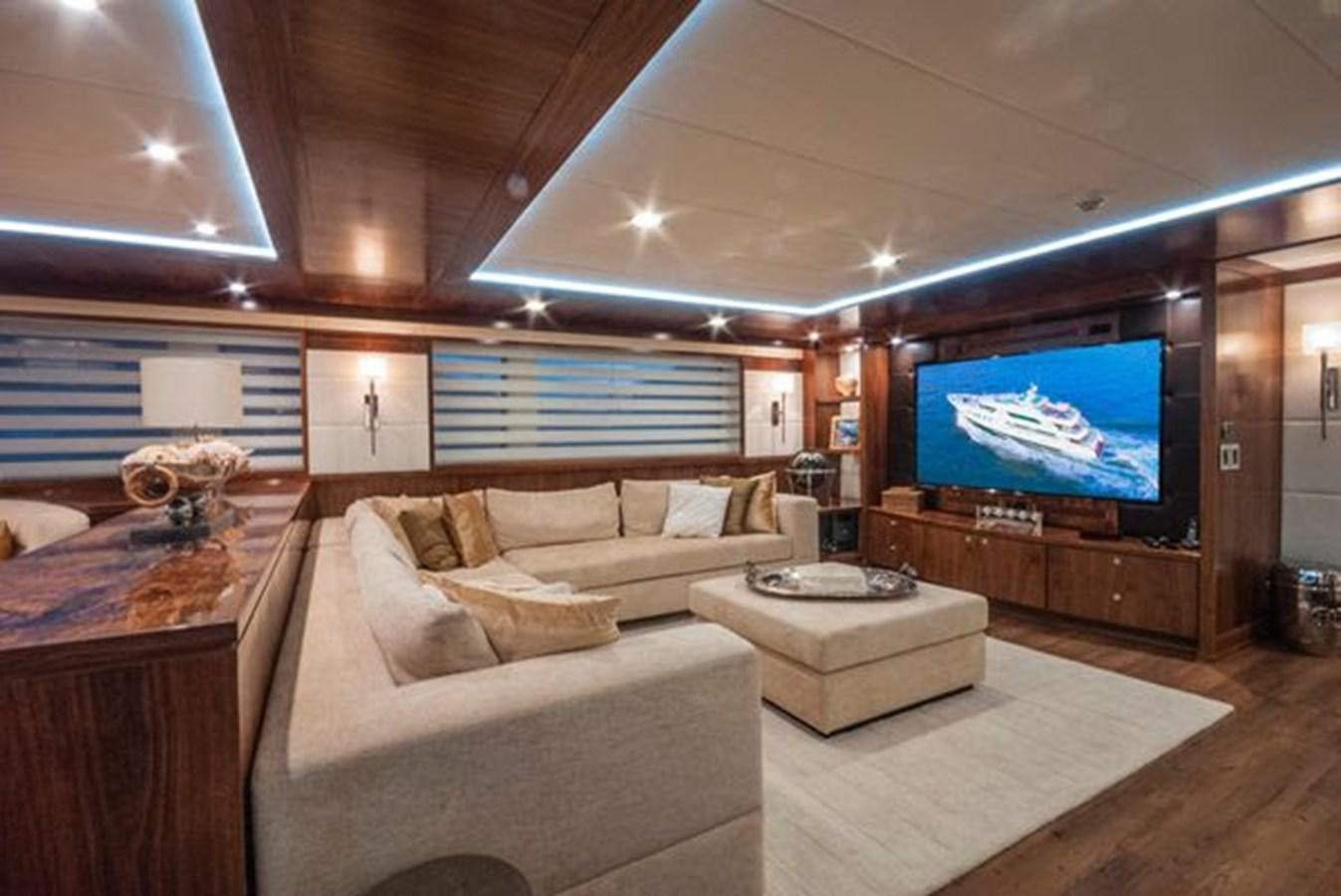 a living room with a large television aboard 2024 MCP MY 140 Yacht for Sale