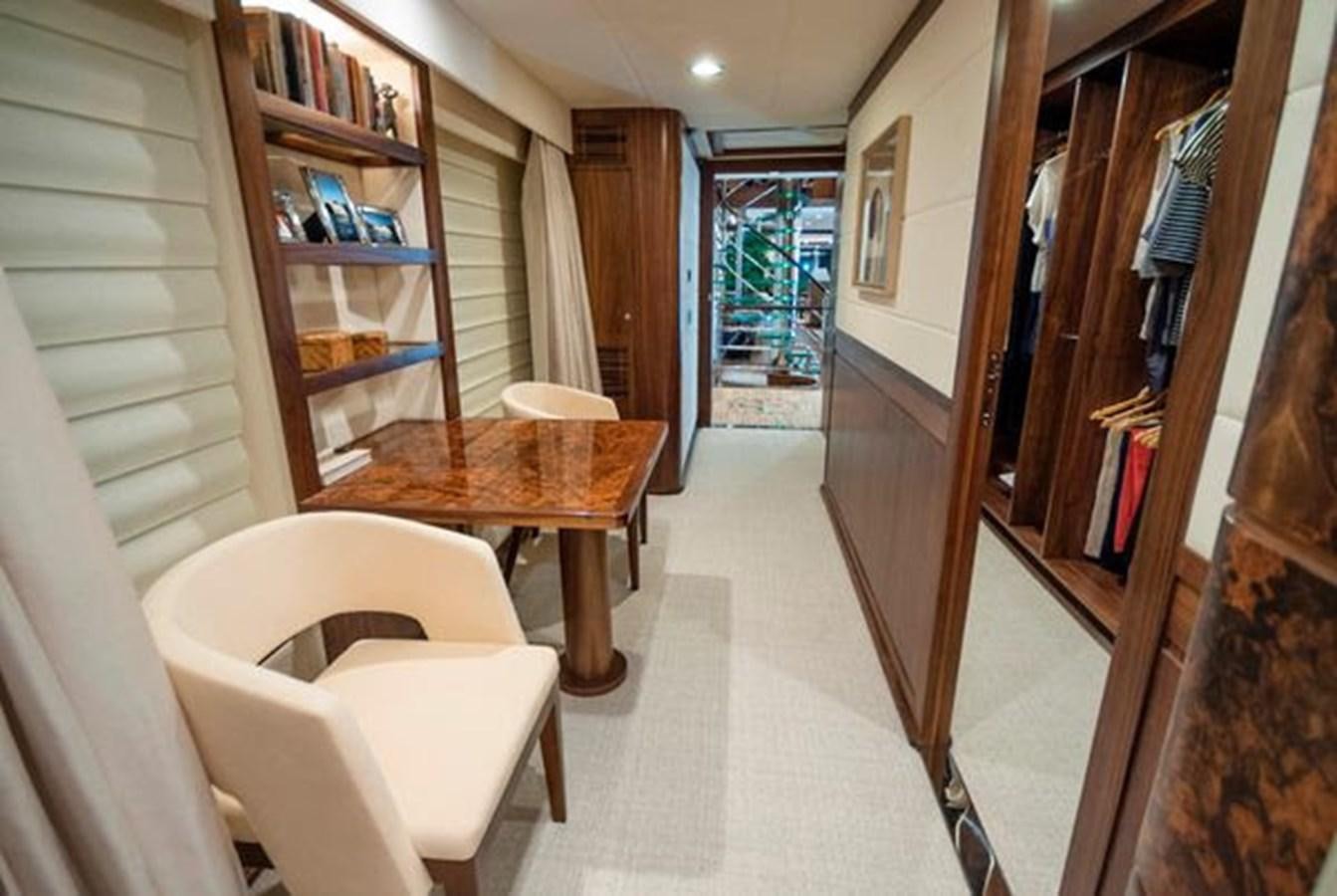 a hallway with a table and chairs aboard 2024 MCP MY 140 Yacht for Sale