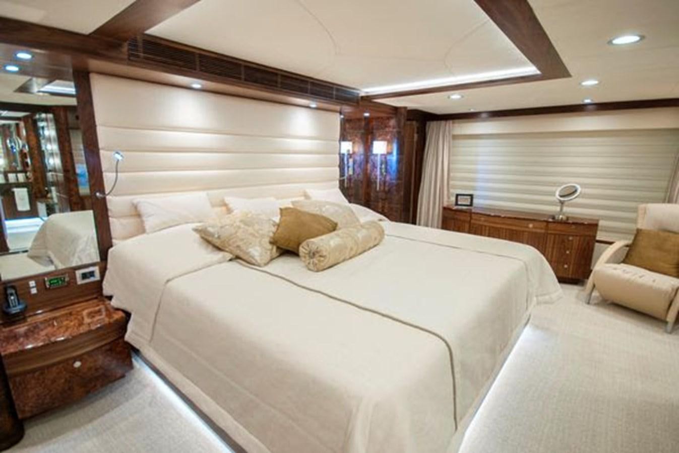 a bed with a white sheet aboard 2024 MCP MY 140 Yacht for Sale