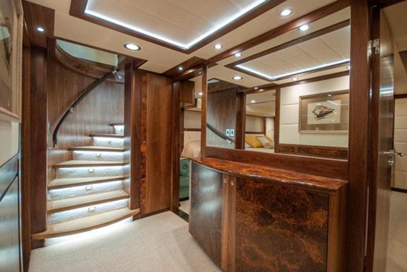 a wood staircase in a building aboard 2024 MCP MY 140 Yacht for Sale