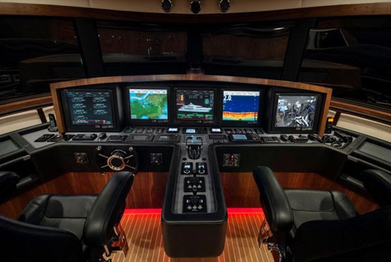 a control panel with many monitors aboard 2024 MCP MY 140 Yacht for Sale