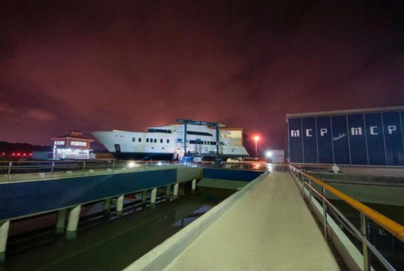 a row of containers on a road aboard 2024 MCP MY 140 Yacht for Sale