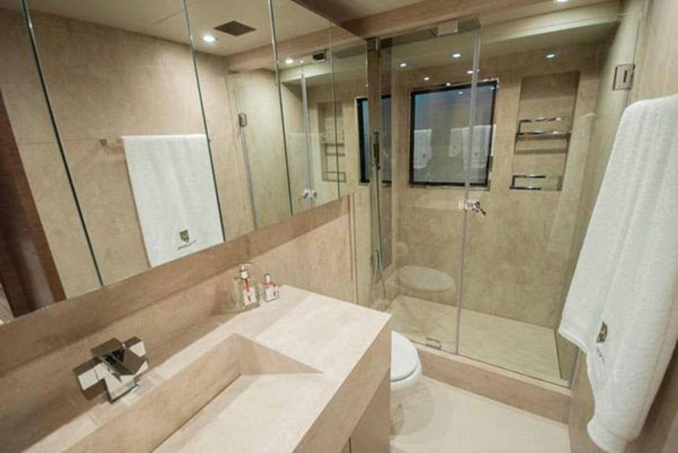 a bathroom with a large mirror aboard 2024 MCP 106 LE Yacht for Sale