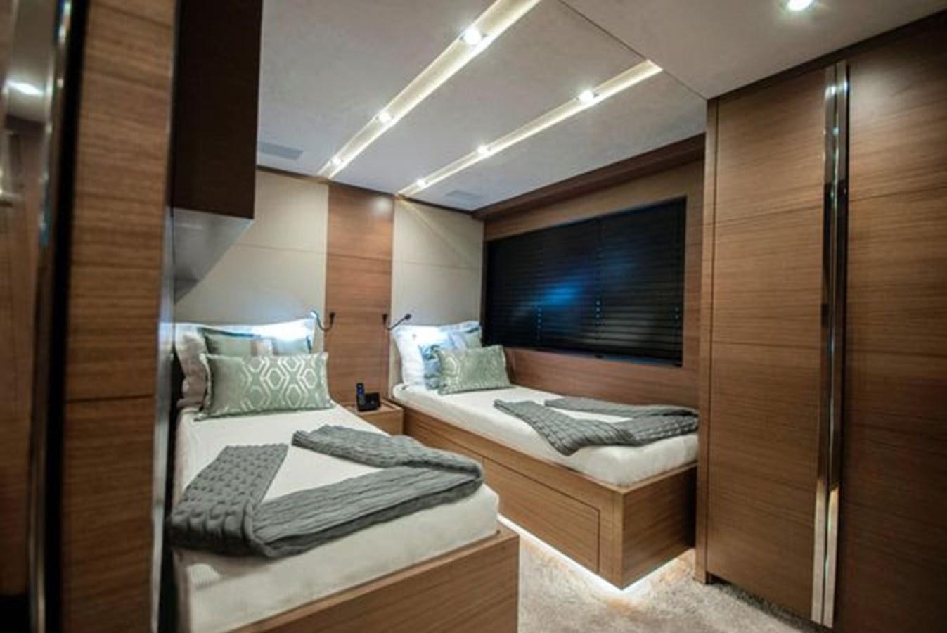 a room with a bed and a tv aboard 2024 MCP 106 LE Yacht for Sale