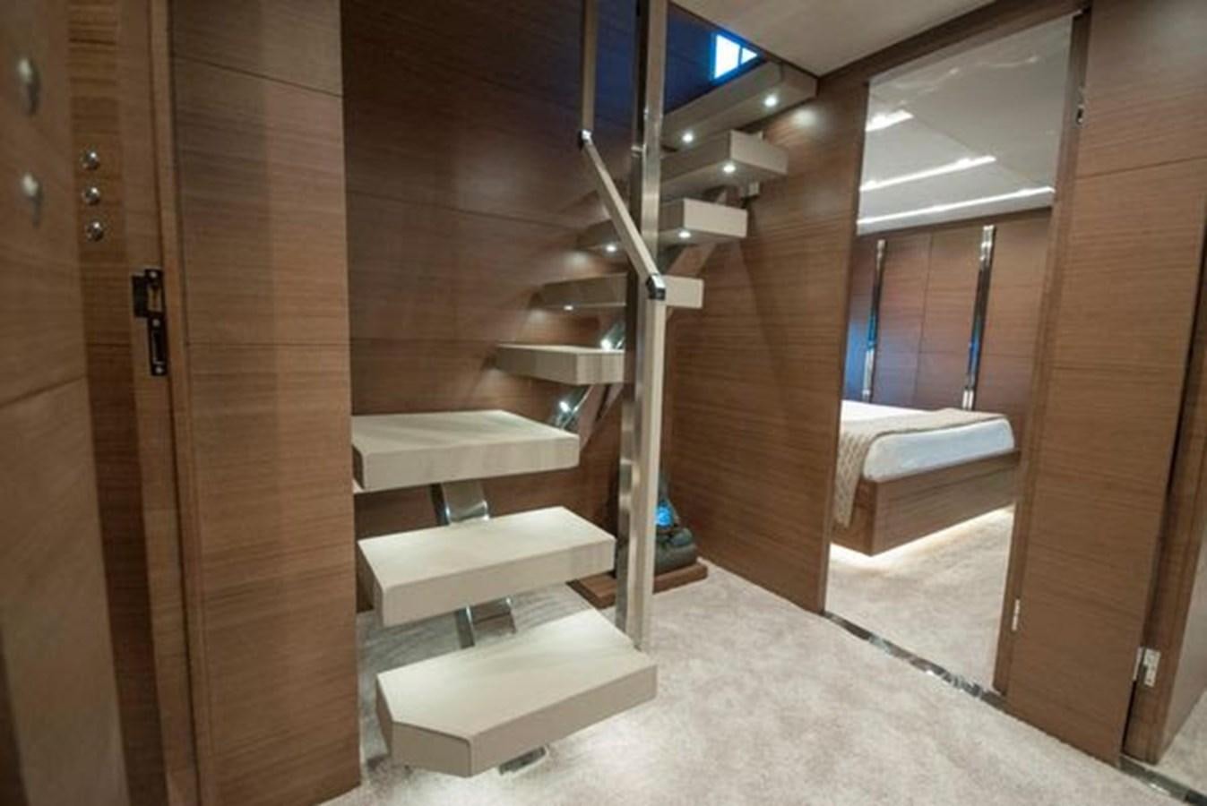 a set of stairs in a room aboard 2024 MCP 106 LE Yacht for Sale