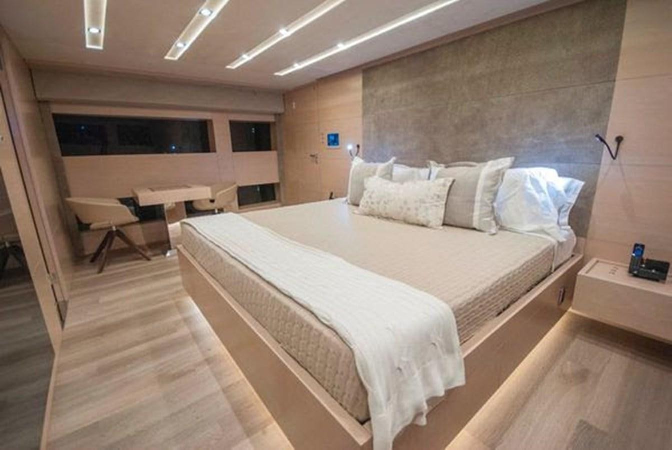 a bed in a room aboard 2024 MCP 106 LE Yacht for Sale