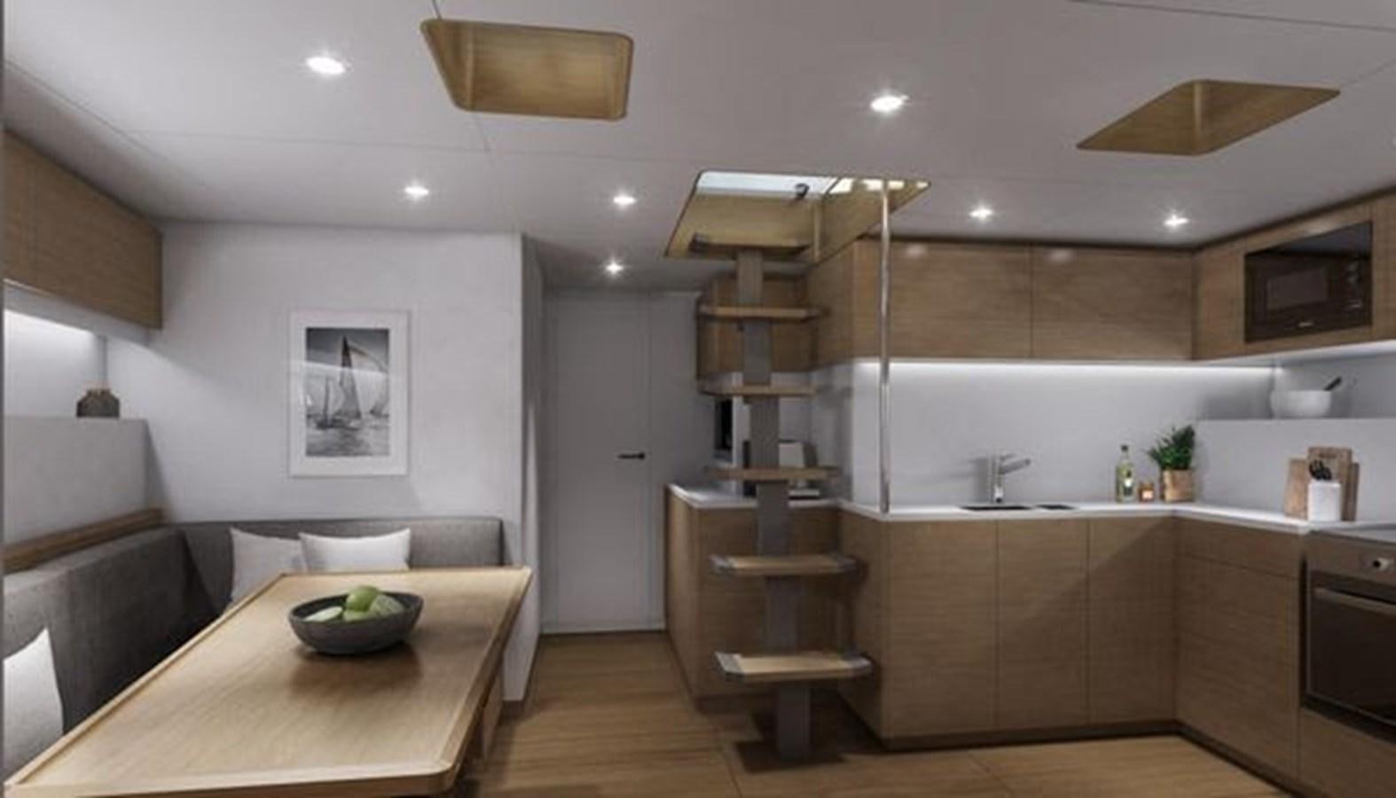 a kitchen with a ladder aboard 2024 MCP SILVER BULLET 100 Yacht for Sale