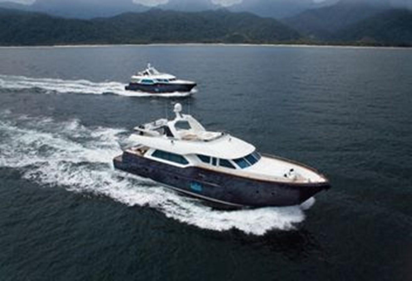 a couple of boats on a body of water aboard 2024 MCP 76 MY Yacht for Sale