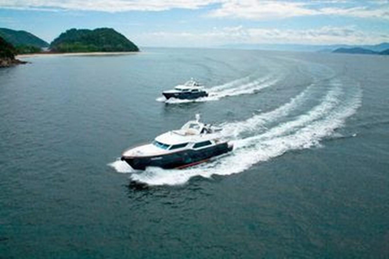 a helicopter flying over a sea aboard 2024 MCP 76 MY Yacht for Sale