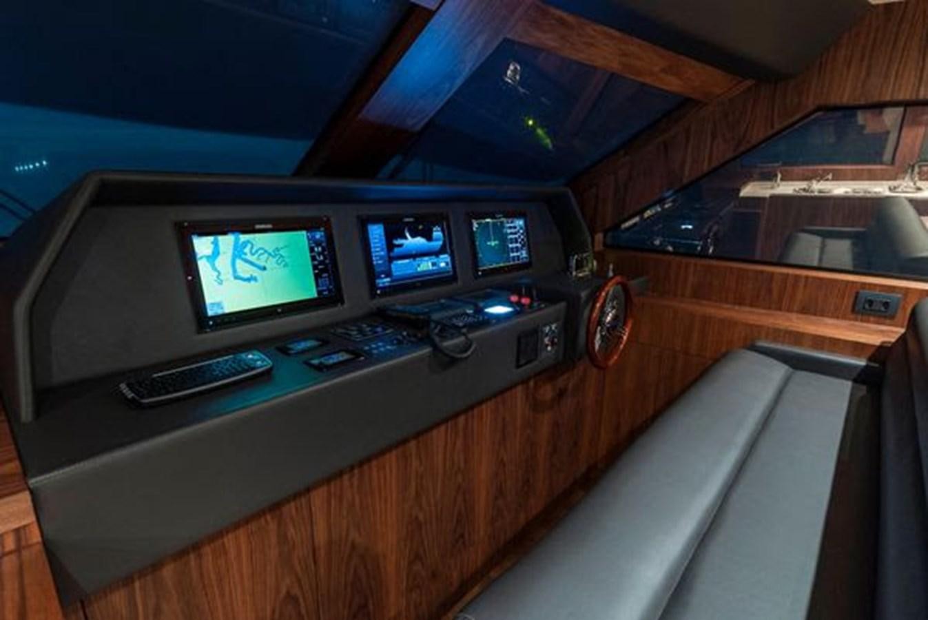 a car on a table aboard 2024 MCP 76 MY Yacht for Sale