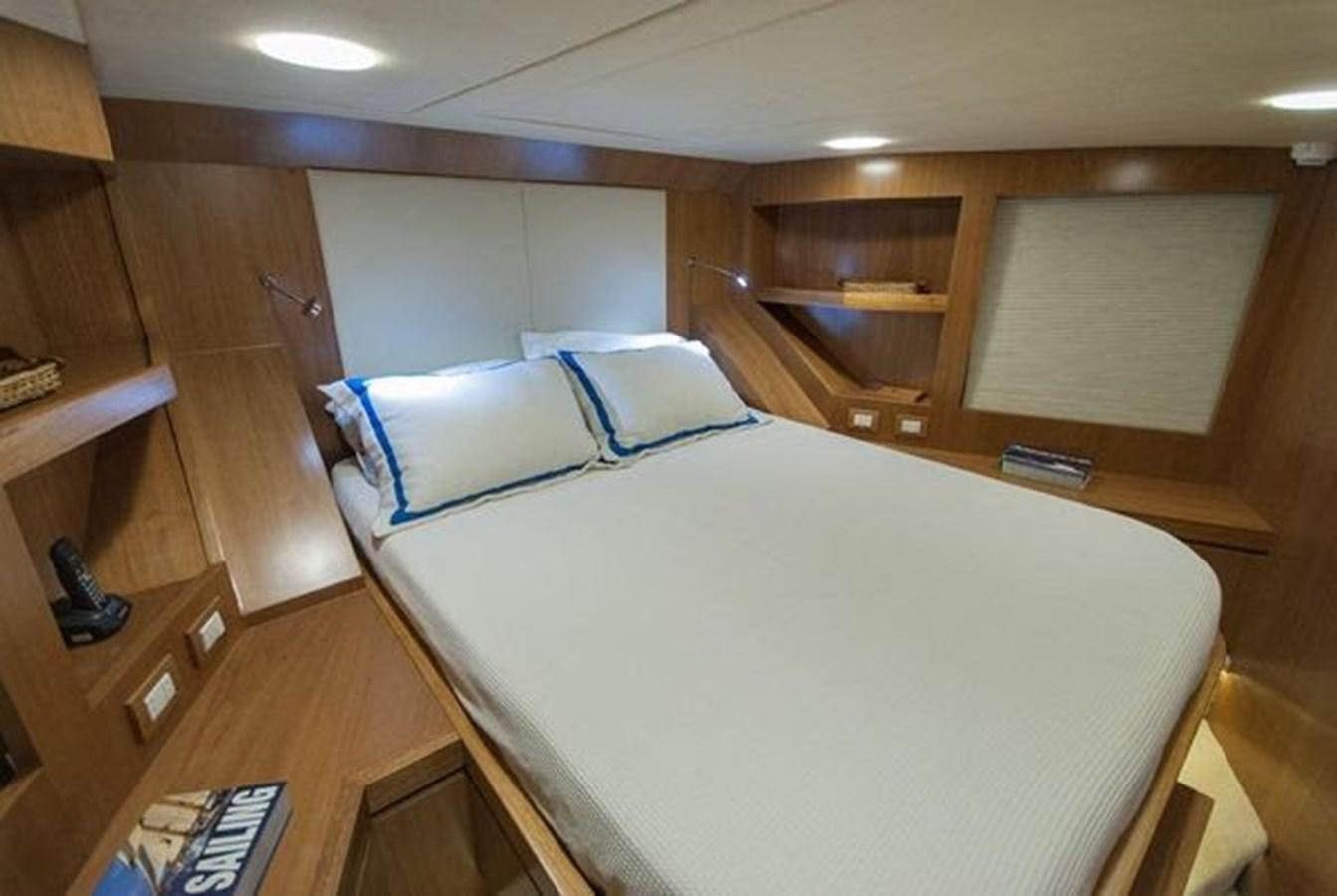 a bed in a room aboard 2024 MCP 76 MY Yacht for Sale