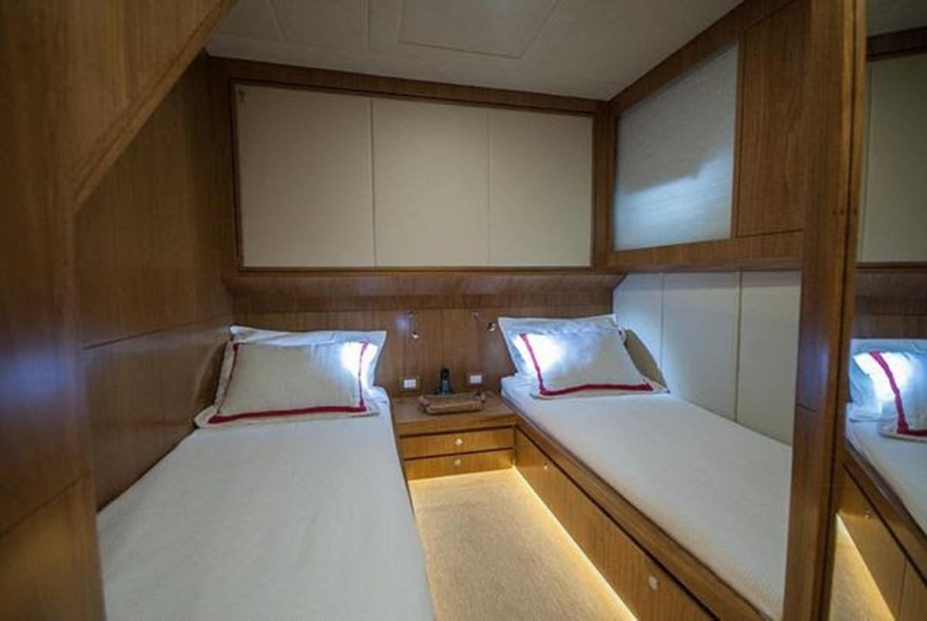 a room with two beds aboard 2024 MCP 76 MY Yacht for Sale