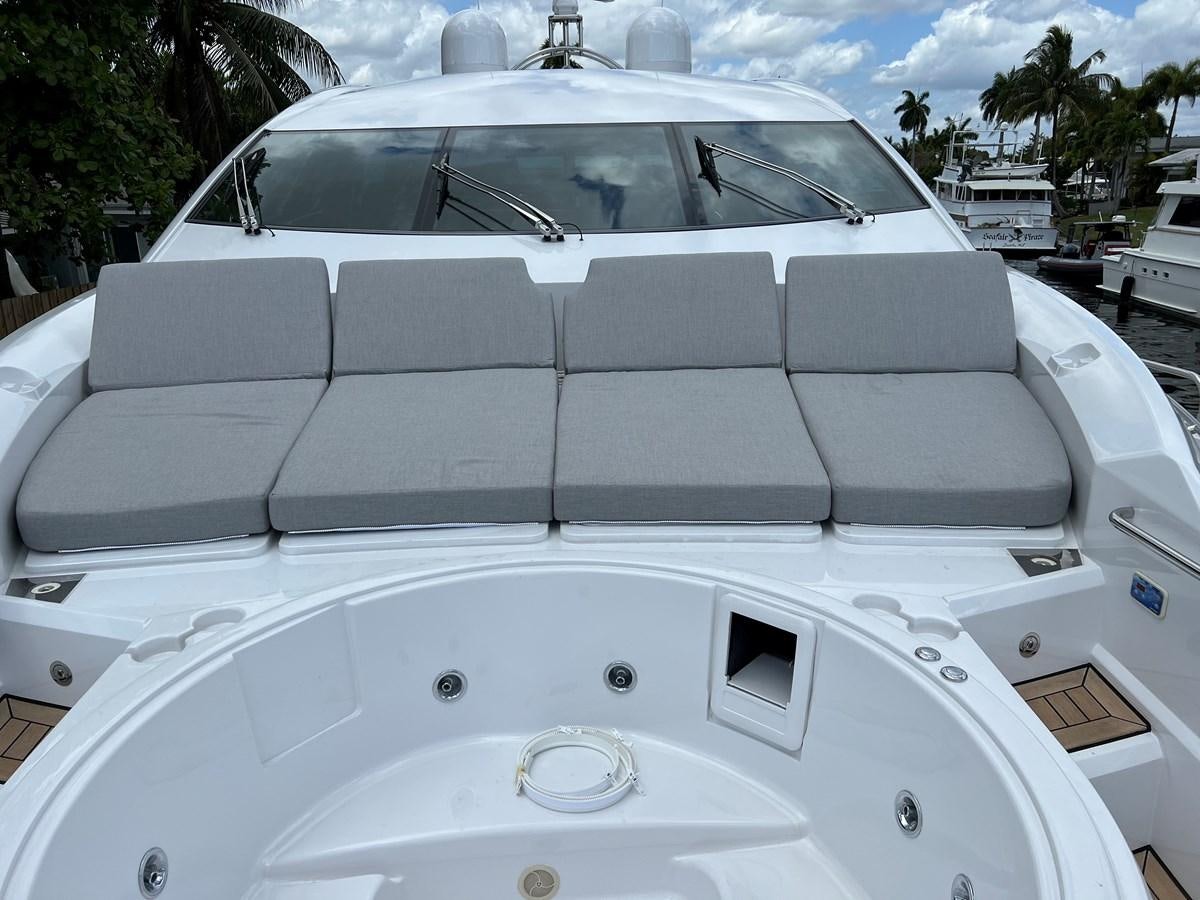 a white car with a roof aboard GBXSK04137L607 Yacht for Sale