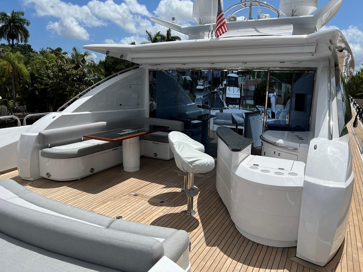 a boat on a deck aboard GBXSK04137L607 Yacht for Sale