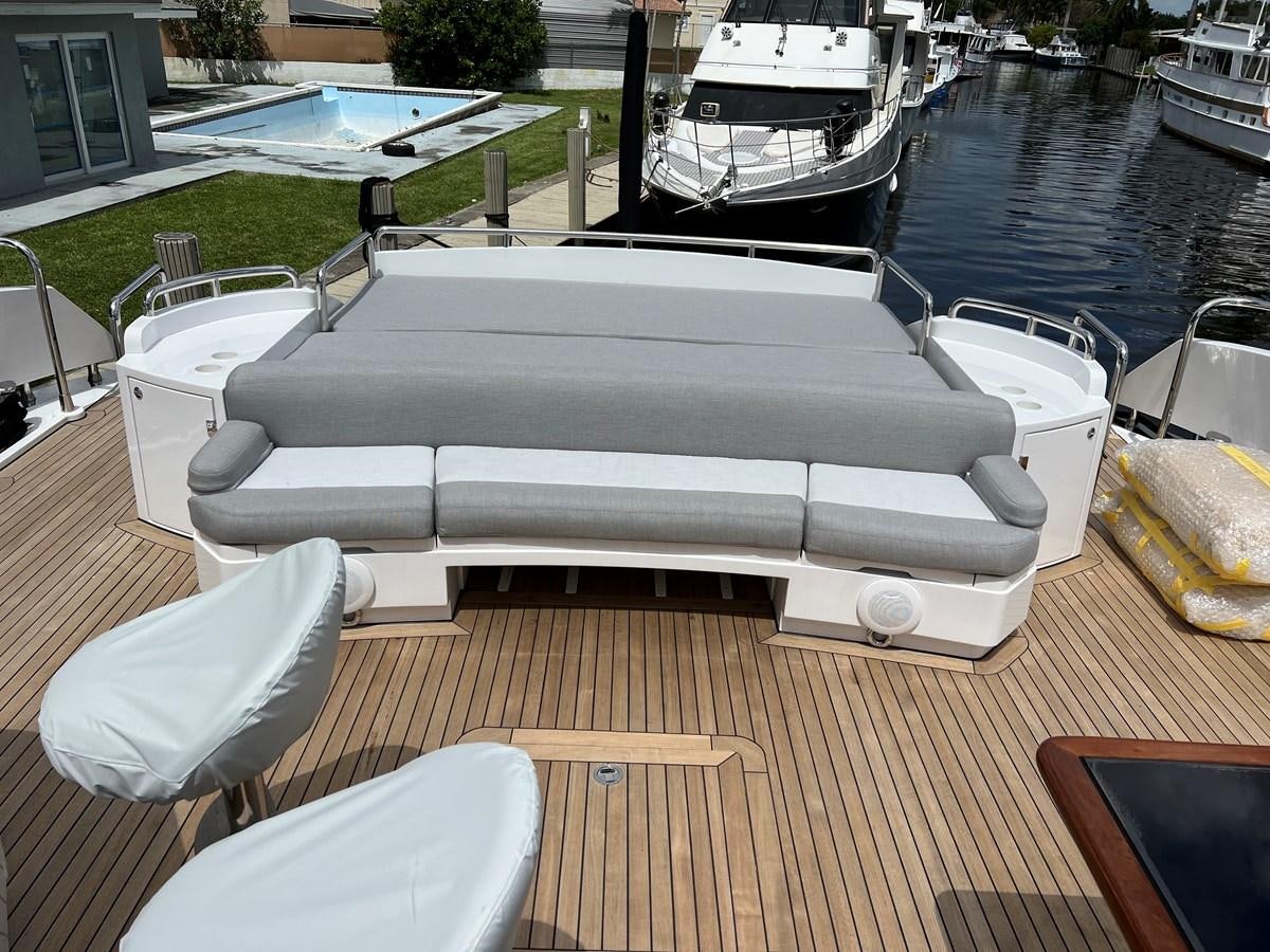 a boat on a deck aboard GBXSK04137L607 Yacht for Sale