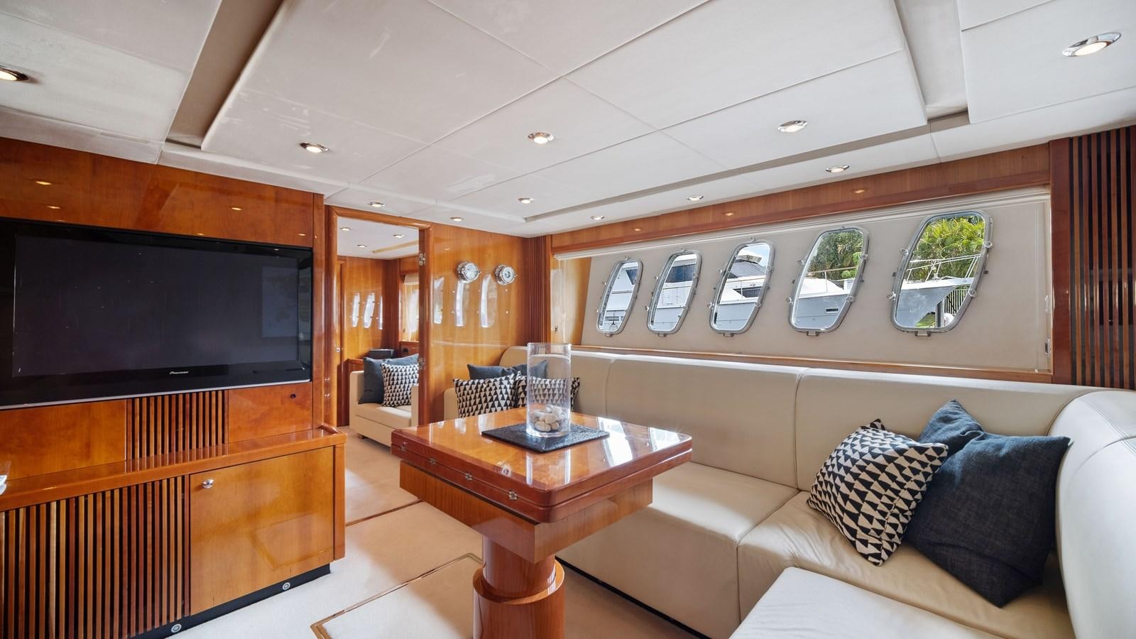 a living room with a couch and a television aboard GBXSK04137L607 Yacht for Sale