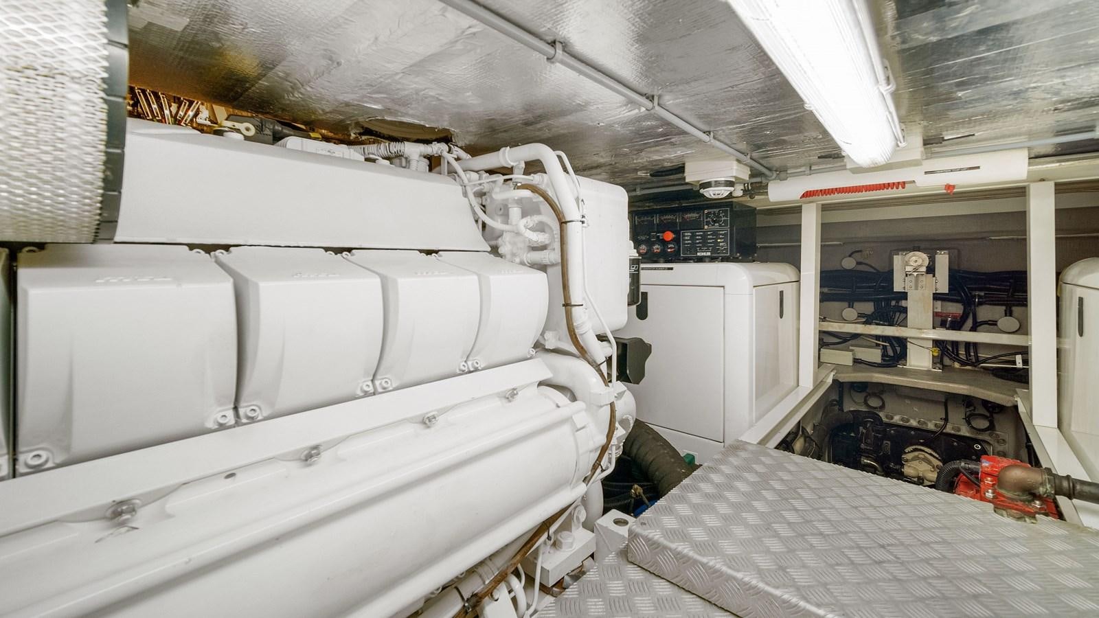 a white machine in a room aboard GBXSK04137L607 Yacht for Sale