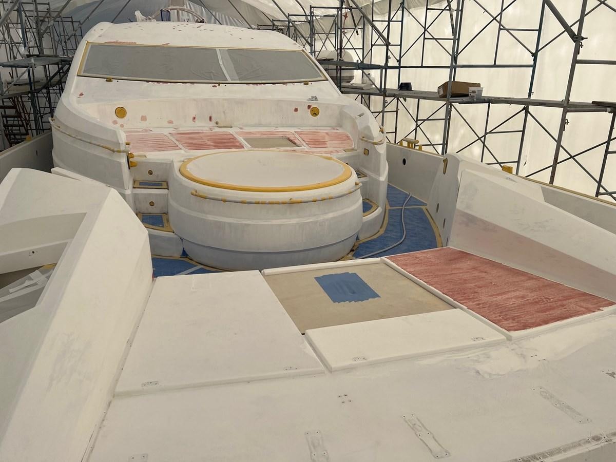 a boat on a deck aboard GBXSK04137L607 Yacht for Sale