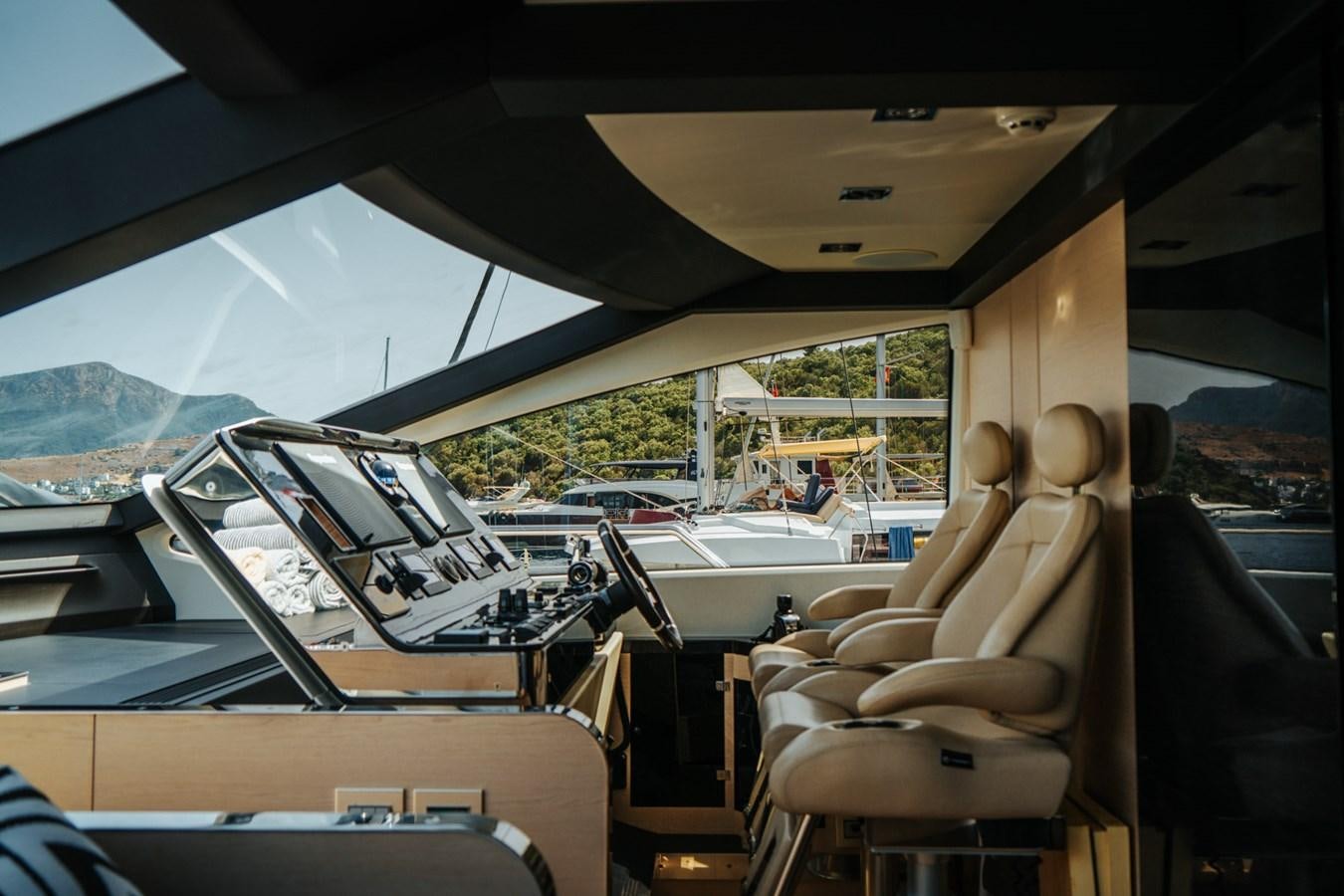 inside of a vehicle with a view of the mountains and the sun aboard AZIMUT 88 DELETE Yacht for Sale