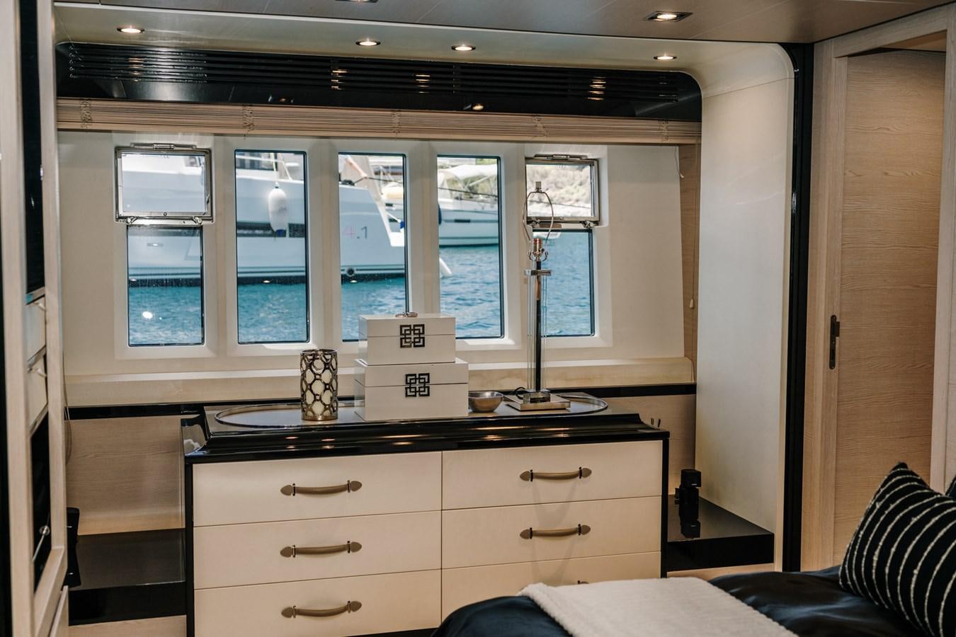 a dresser in a room aboard AZIMUT 88 DELETE Yacht for Sale