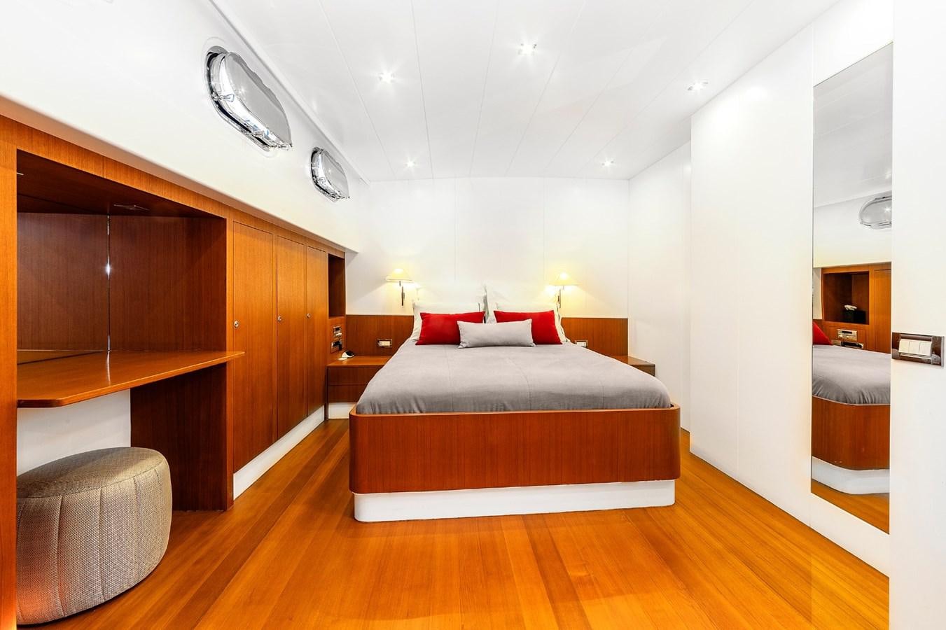 a bed in a room aboard UBI BENE Yacht for Sale