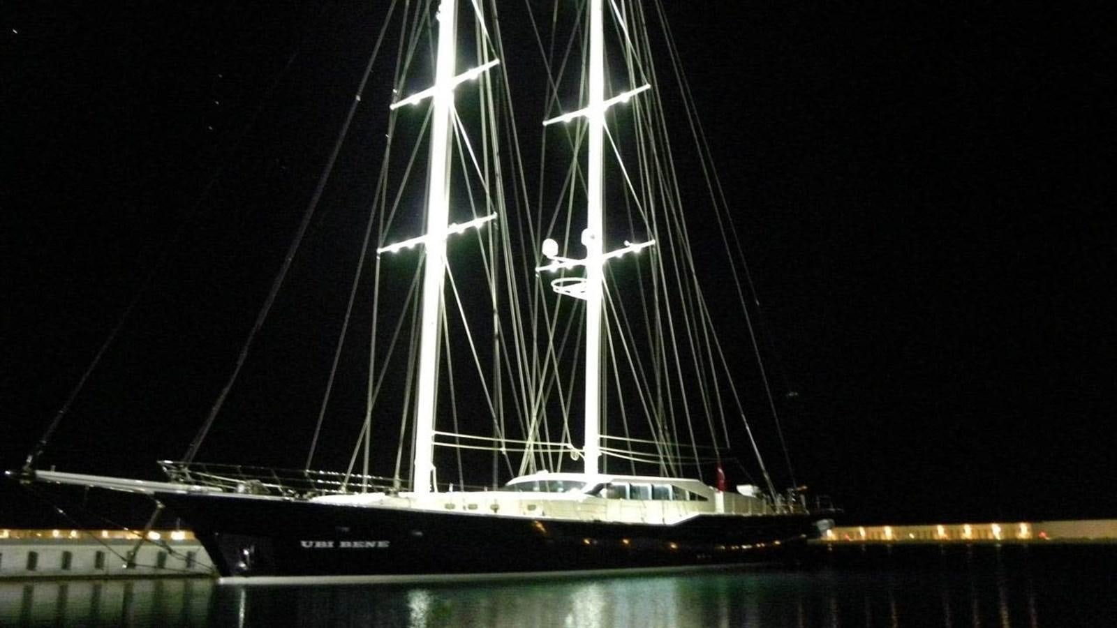 a large sailboat at night aboard UBI BENE Yacht for Sale