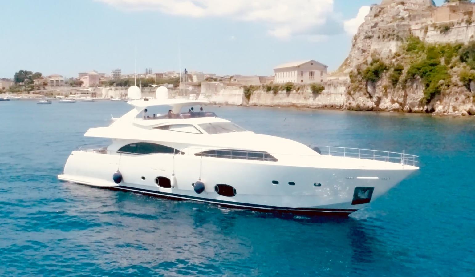 a white yacht in the water aboard THIRTEEN Yacht for Sale