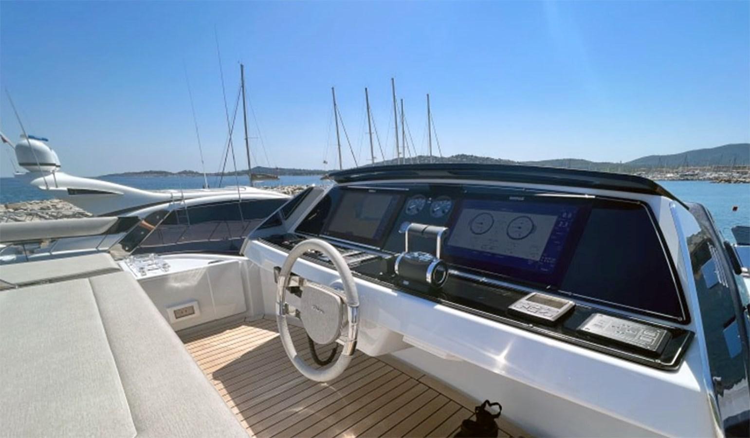 the inside of a car aboard KAR Yacht for Sale