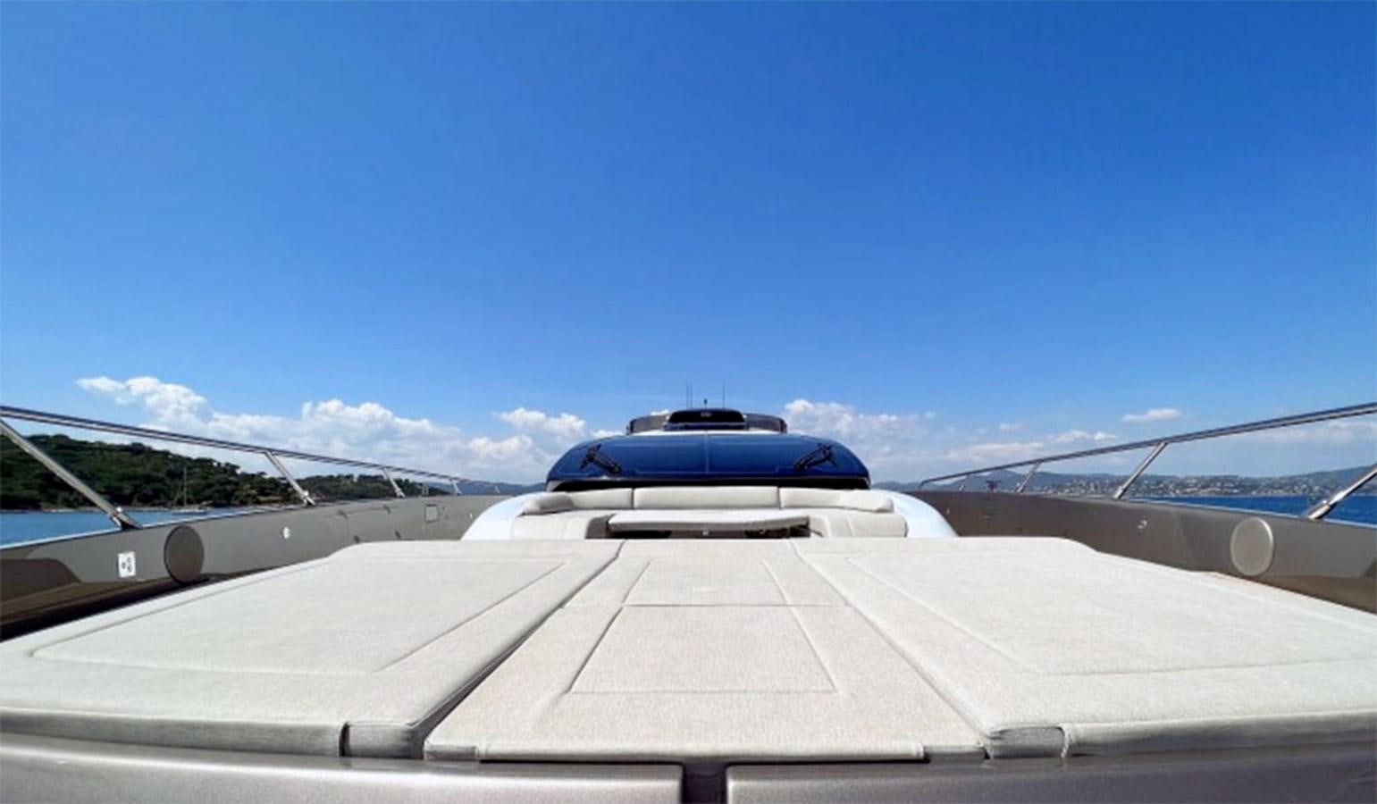 a car on a road aboard KAR Yacht for Sale