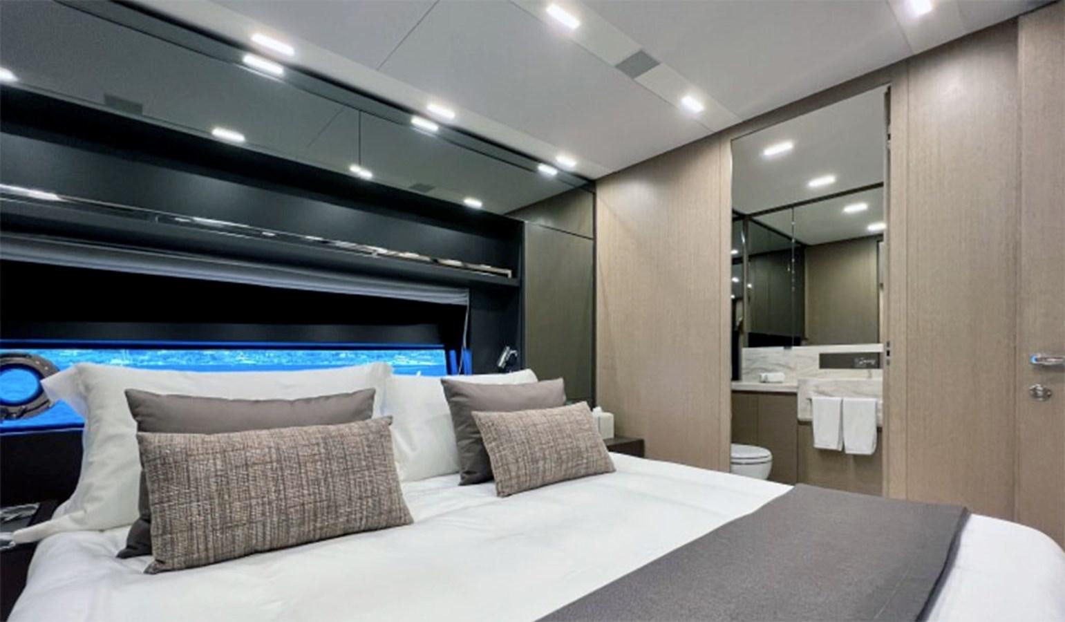 a bed in a room aboard KAR Yacht for Sale