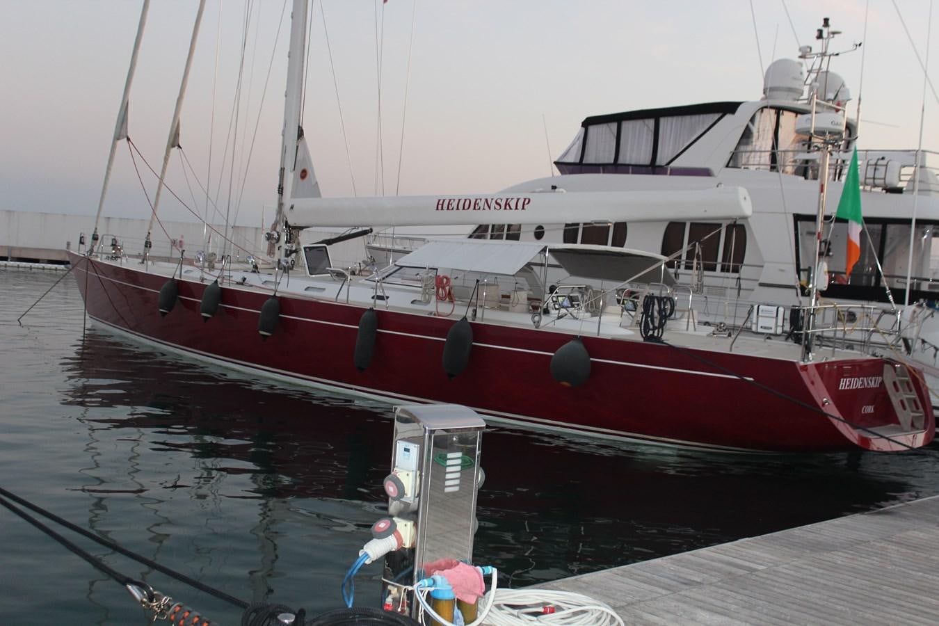 a boat docked at a pier aboard HEIDENSKIP Yacht for Sale