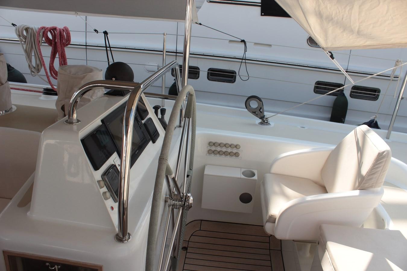 a white chair in a room aboard HEIDENSKIP Yacht for Sale