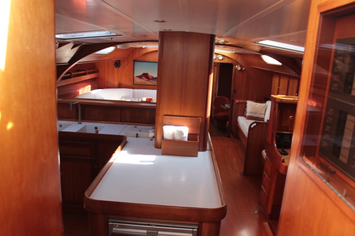 a room with a table and chairs aboard HEIDENSKIP Yacht for Sale