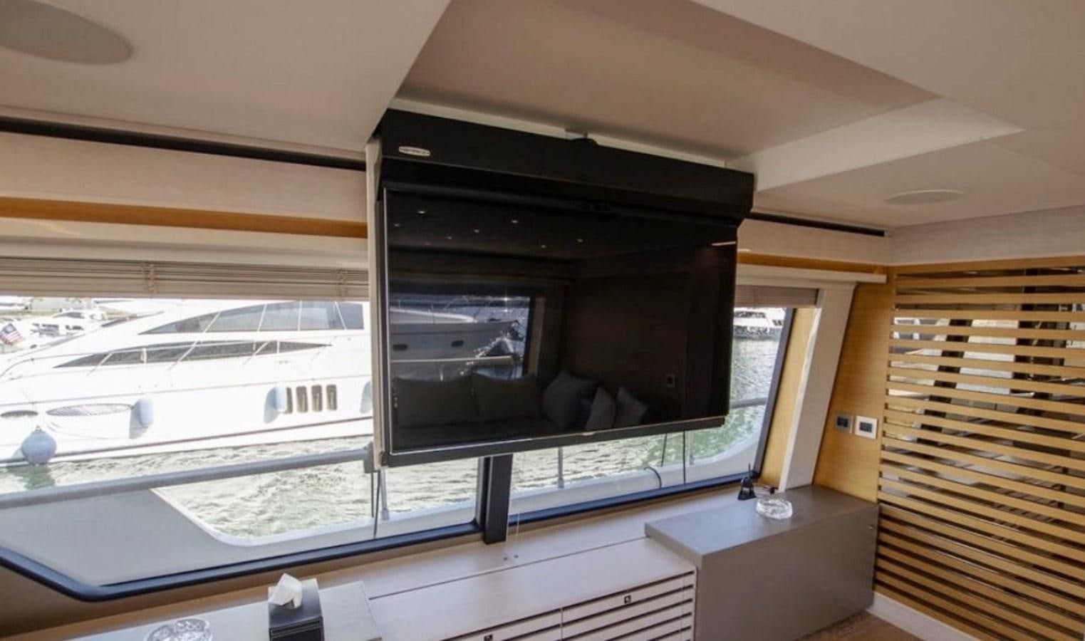 a large black fireplace in a room aboard NAVETTA 28 Yacht for Sale