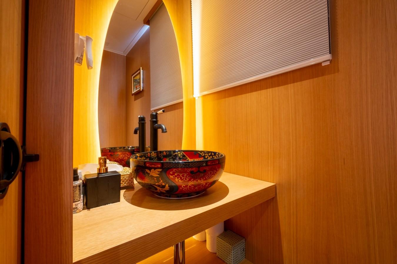 a counter with bowls of food on it aboard MURAL 85 Yacht for Sale