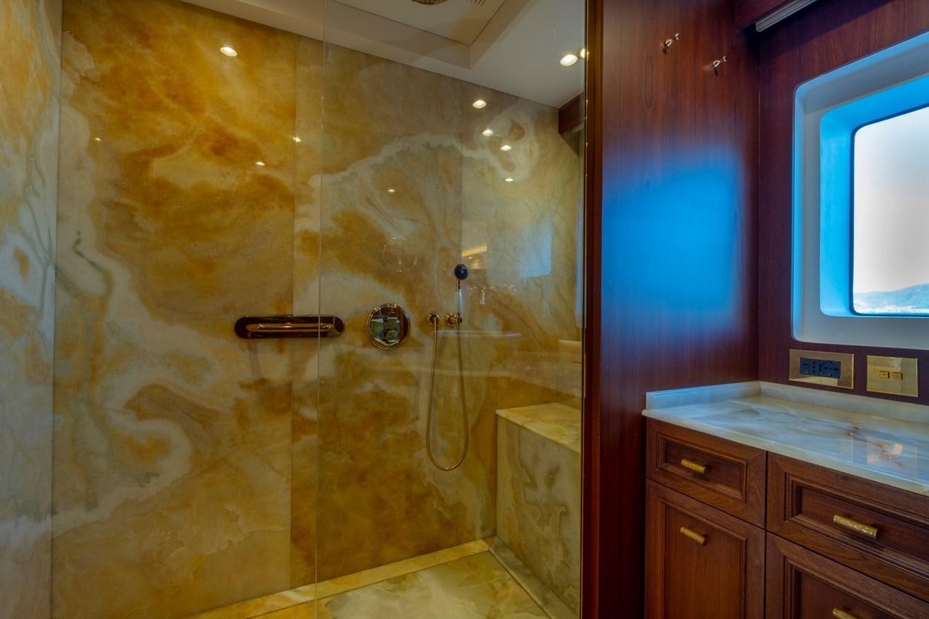 a bathroom with a shower aboard MURAL 85 Yacht for Sale