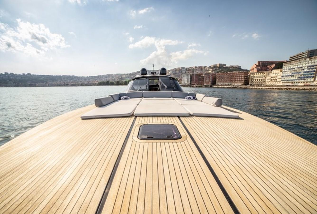 a boat on a dock aboard BLUE MAMBA Yacht for Sale