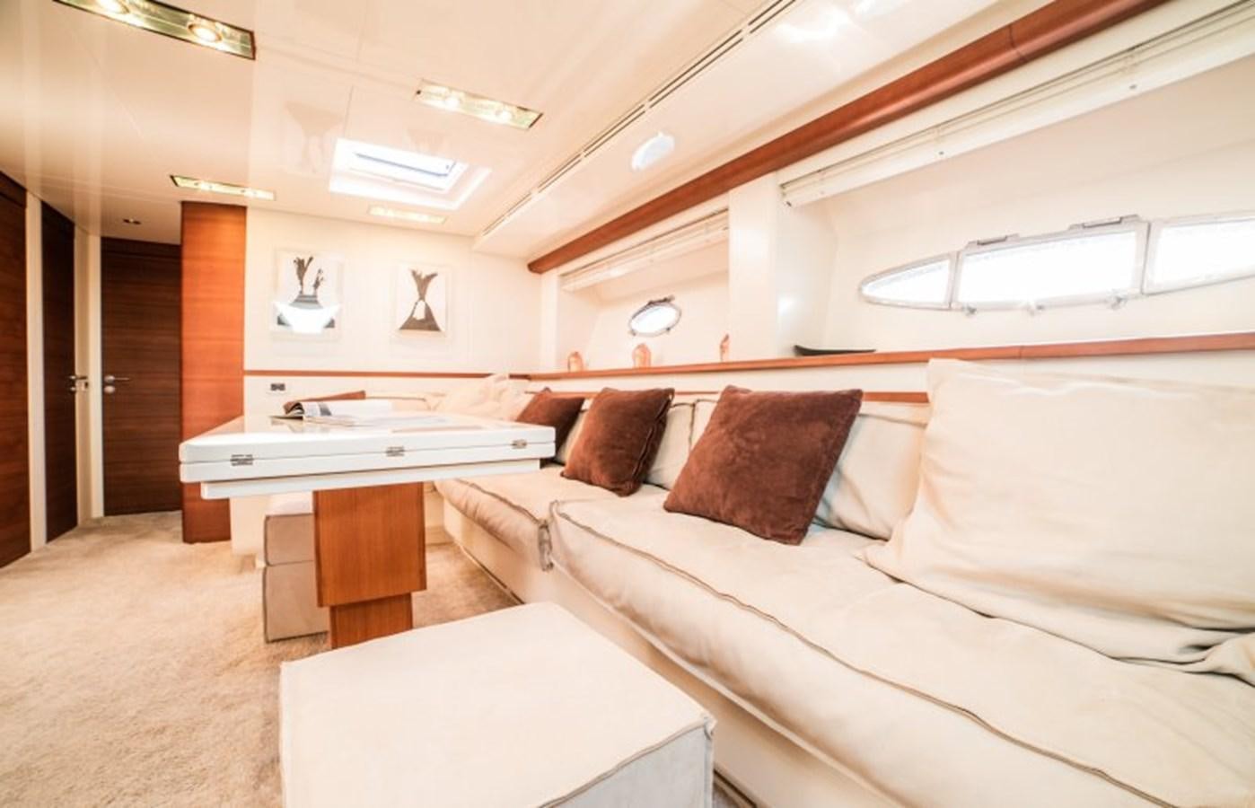 a room with a bed and a desk aboard BLUE MAMBA Yacht for Sale