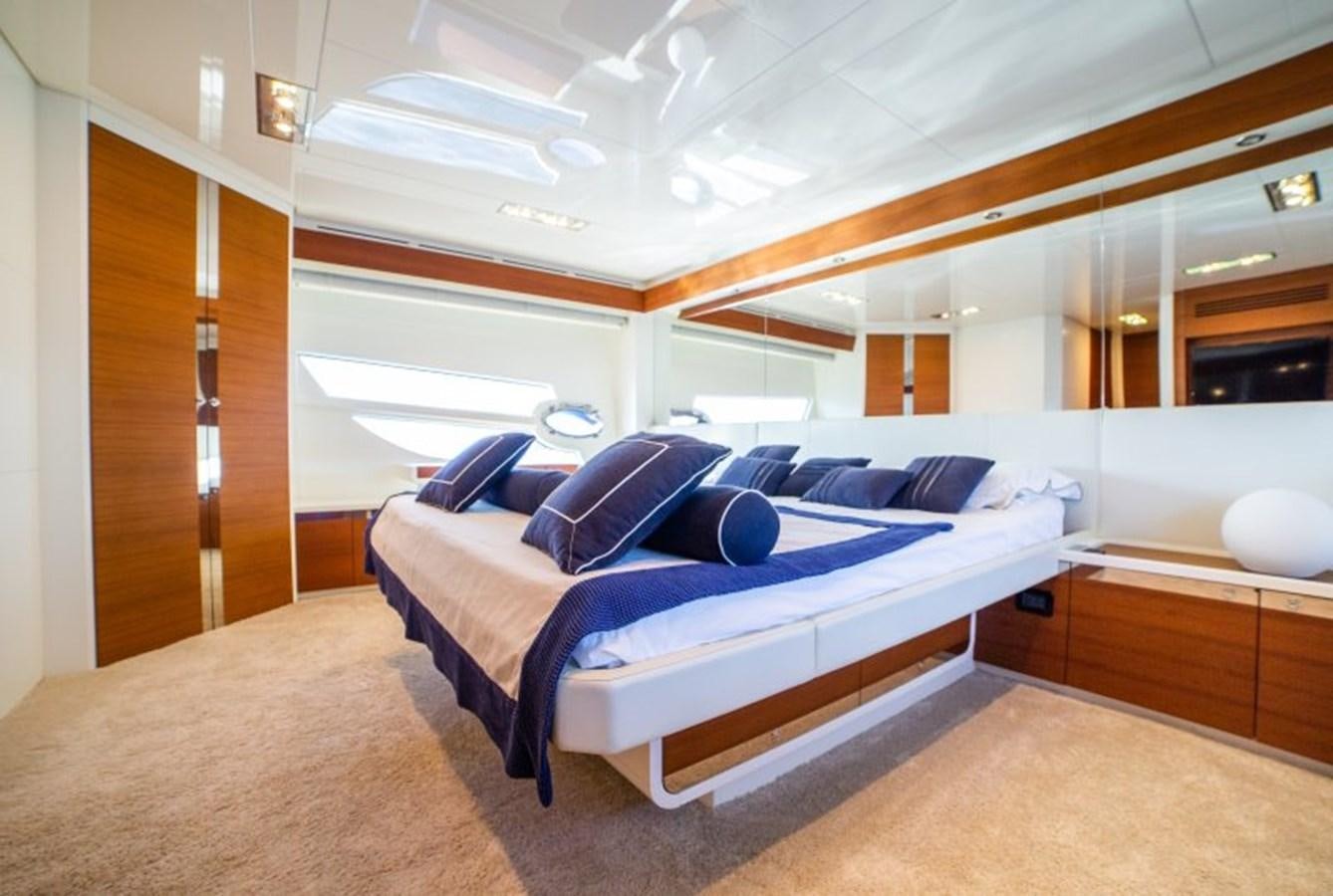 a bed in a room aboard BLUE MAMBA Yacht for Sale