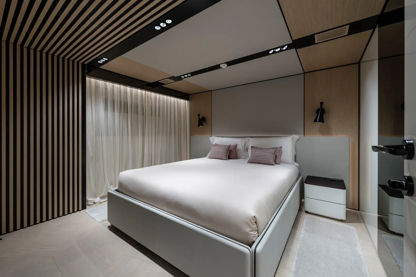 a room with a bed and a desk aboard ISA GT 45 Yacht for Sale