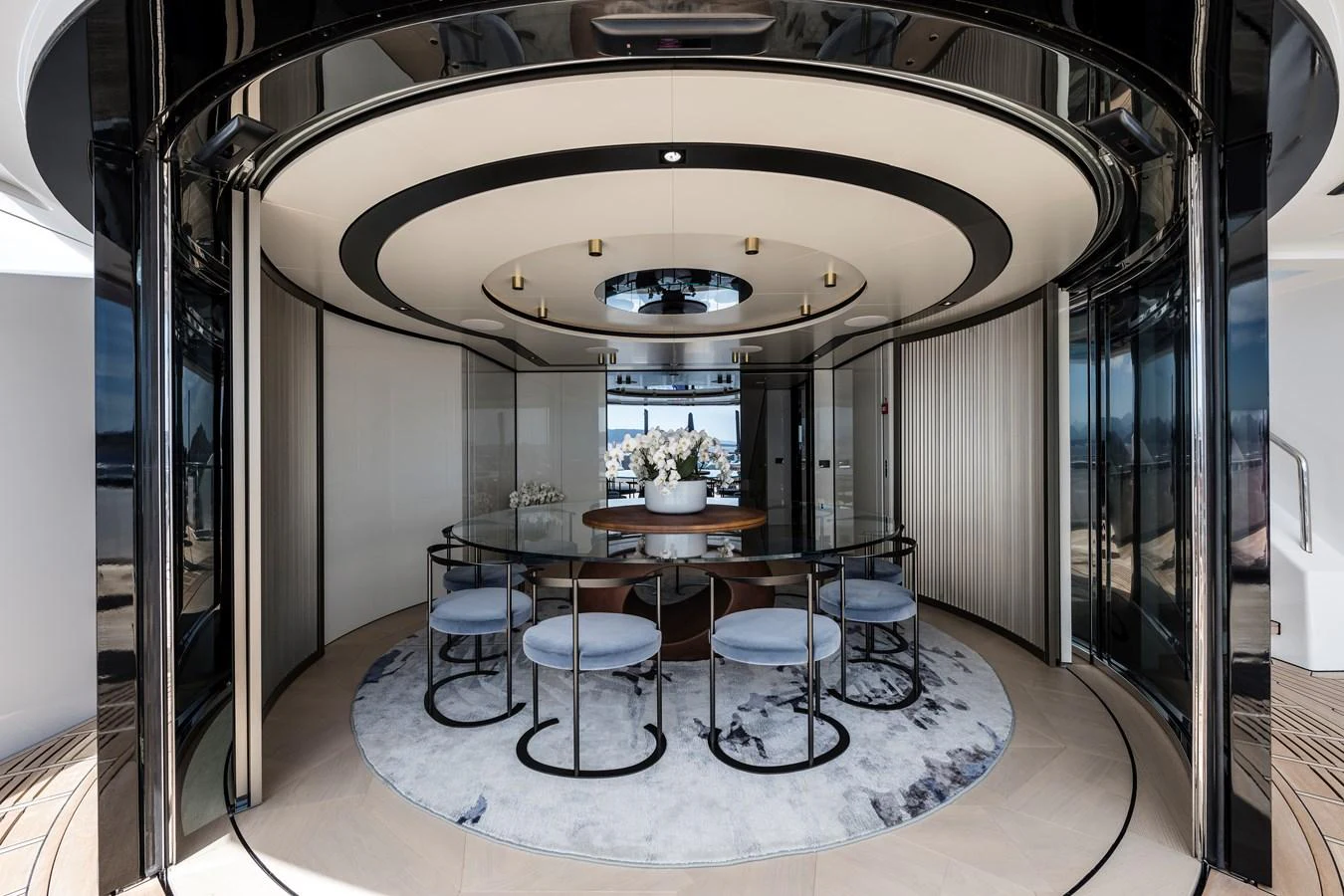 a room with a table and chairs aboard ISA GT 45 Yacht for Sale