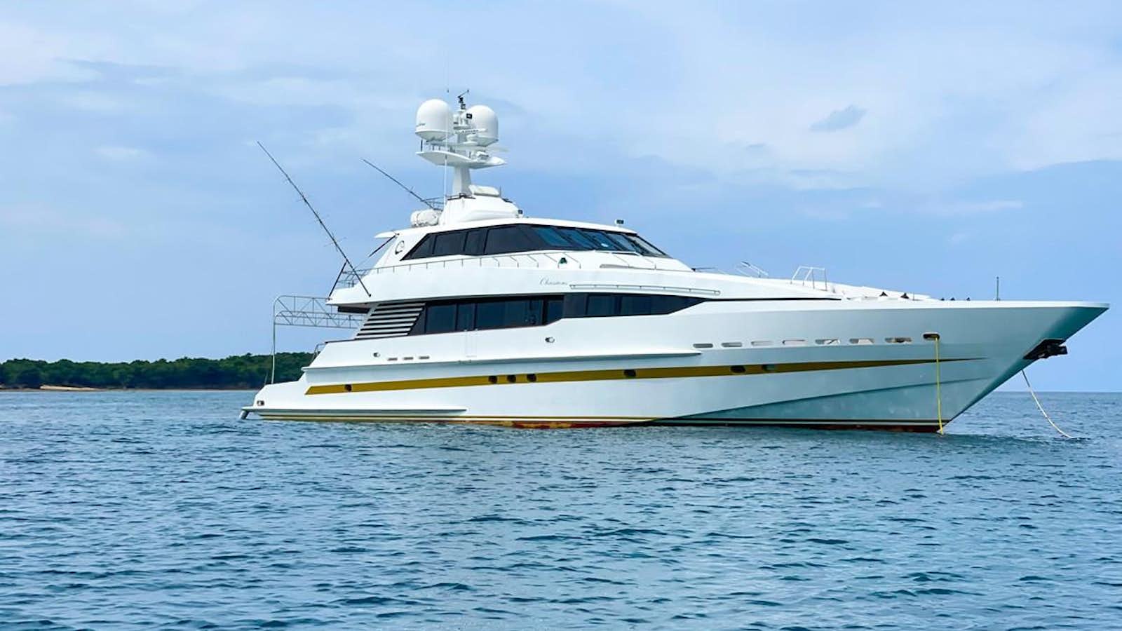 a white boat in the water aboard OBSESSIONS Yacht for Sale