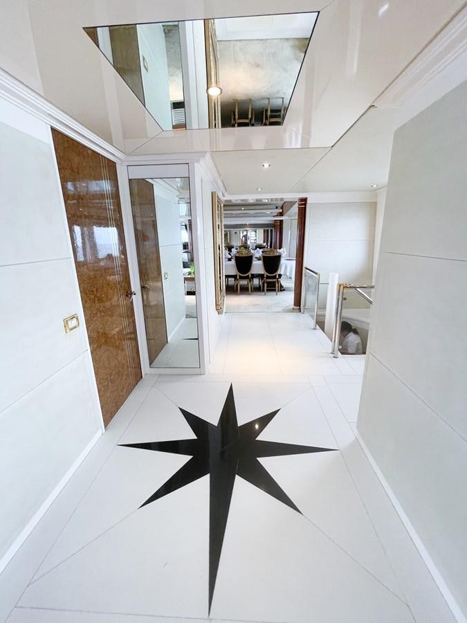 a hallway with a mirror aboard OBSESSIONS Yacht for Sale