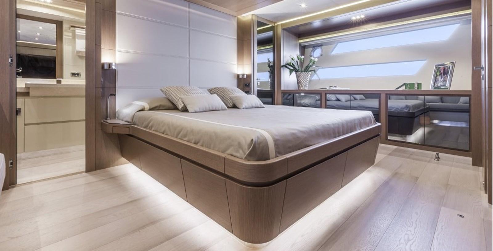 a bed in a room aboard DOLLY Yacht for Sale