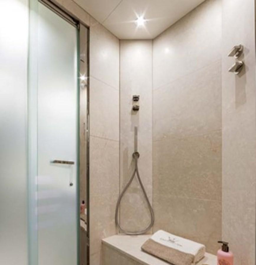 a shower with a towel from it aboard DOLLY Yacht for Sale