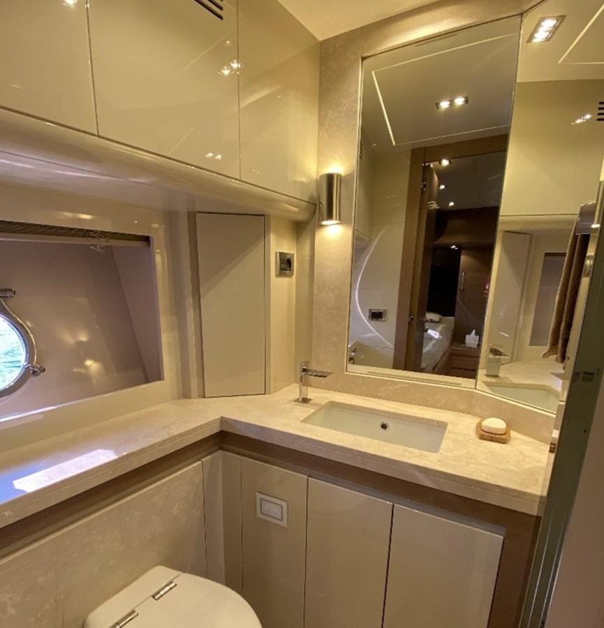 a bathroom with a large mirror aboard DOLLY Yacht for Sale