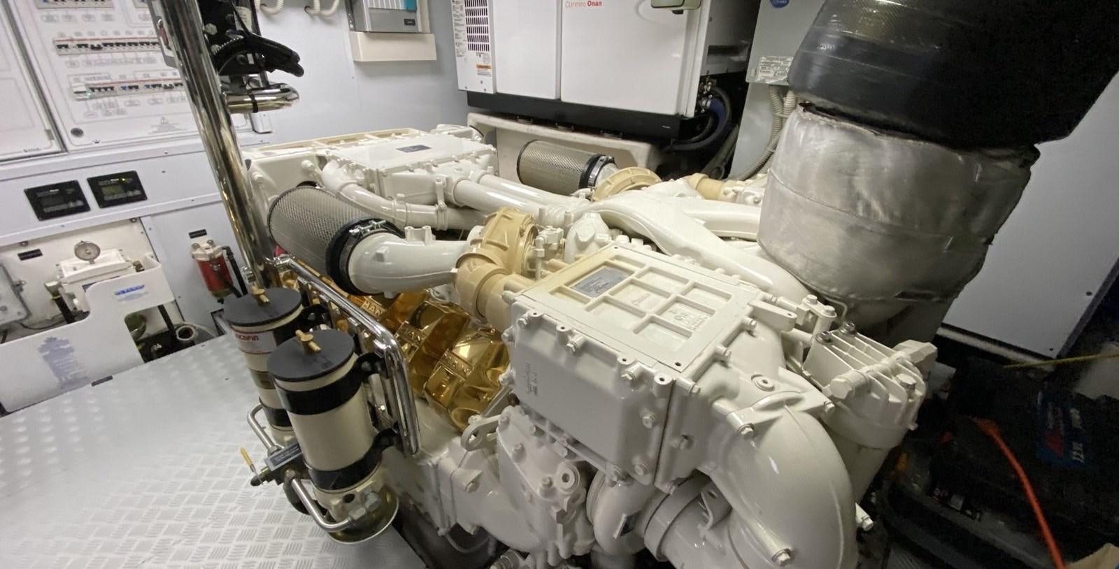 a machine with a large metal object aboard DOLLY Yacht for Sale