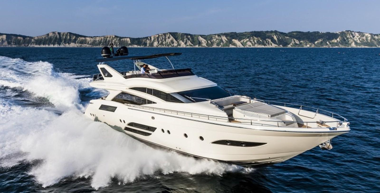 a white yacht on the water aboard DOLLY Yacht for Sale